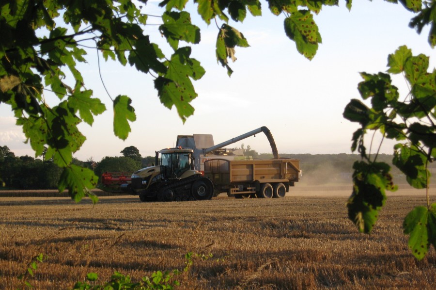 Combine harvester and tractor